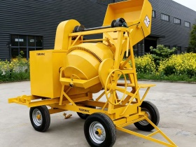 Portable concrete mixer with bucket